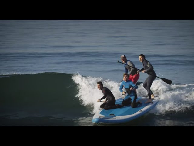 The Body Glove Crusader 4-6 person inflatable paddleboard offers a new adventure experience on the water in a Gargantuan kind of way. With a super stable paddling platform, the whole family can move around with ease and have fun on the water all at once with 1000 lb capacity. The sleek and fast design with extreme nose rocker allows for endless multi-person surf sessions and will definitely turn some heads in the surf line up.<br /> <br />The Crusader is built incredibly tough with triple layer stringer construction and double layered side rails. Great for exploring around the lake with the family, using an anchored swim platform or doing a group stand up paddle board or surf experience with friends. Time spent on the water is always more enjoyable with family and friends and the Crusader is the perfect vessel.<br /><br />Package & Design Features: <br /> • Triple layer construction <br /> • Front bungee storage area <br /> • Quad Dura-fin design <br /> • Double-layered side rail <br /> • Oversize traction pad <br /> • Cooler attachment points <br /> • 7 different carry handles <br /> • Water bottle holder <br /> • 2 pumps & 4 adjustable SUP paddles <br /> • 1 coil leash<br /><br /><br />Shop Body Glove SUPs: http://bit.ly/2C6X9z3 <br /><br />#AllThingsWater #BodyGlove #ISUP<br /><br />Love Body Glove? Find more of us here: b<br />Facebook: https://www.facebook.com/bodyglove/ <br />Instagram: https://www.instagram.com/bodyglove/<br /> https://www.instagram.com/bodyglovegirl/ <br />Website: https://www.bodyglove.com/