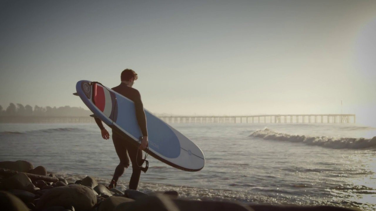 The BodyGlove EZ 8’2” Inflatable longboard brings a new kind of fun travel experience to surfing hassle-free, while also allowing you to travel and surf anywhere in the world without the hassle of flying with a bulky surfboard. The EZ longboard rolls down small to fit in almost any travel bag, ultra-durable to take some rough abuse, and is easy to surf any wave you can throw at it. <br />The durable double layered drop stitch and high-pressure 20 psi construction creates a stiff, fast, and fun performing surfboard for any skill level. The 2.75” thickness and narrow pintail design allows for better edging, carving, and maneuvering on the wave. Being more buoyant than a traditional hardboard, the EZ allows you to paddle faster on top of the water, enabling you to catch more waves with ease. Whether you’re flying to your next beach break or cruising down the street to your home wave, the EZ 8’2” will provide endless and hassle-free fun to any surfer. <br /><br />Package & Design Features: <br /> • Double layer PVC for added stiffness <br /> • Triple unbreakable Dura-fin design <br /> • Double-layered side rail <br /> • Soft crocodile EVA traction <br /> • Longboard pintail design for faster and higher carving performance <br /> • 8ft straight surf leash<br /><br /><br />Shop Body Glove Inflatable Surfboards: http://bit.ly/2V4FBP2<br /><br />#AllThingsWater #BodyGlove #ISUP #Surfing<br /><br />Love Body Glove? Find more of us here: <br />Facebook: https://www.facebook.com/bodyglove/ <br />Instagram: https://www.instagram.com/bodyglove/<br /> https://www.instagram.com/bodyglovegirl/ <br />Website: https://www.bodyglove.com/