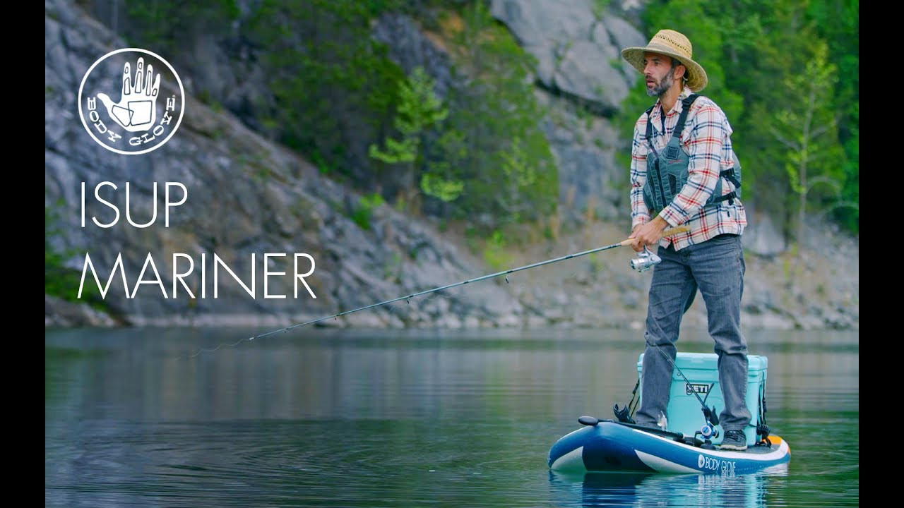 The Body Glove Mariner is a fishing specific inflatable standup paddleboard coming in 2018, catering to both casual fishing enthusiasts and hardcore anglers. Designed by paddling champ and fisherman Luke Hopkins, this feature-rich board is the ideal paddling platform for the active angler. The Mariner is durable, stable, convenient to transport and can be fully equipped. Key features include: <br /> <br />• Multiple attachment points in convenient locations to add any of the 71 RAILBLAZA accessories, such as rod holders, cleat ports, etc.<br />• An anchor line guide system to lower and raise an anchor from the standing position<br />• A cooler tie-down that can accommodate a cooler of up to 45 L<br />• The world’s first patented multi-purpose handle that can carry a paddle during transport or a water bottle while padding for easy access<br />• Three permanent, unbreakable fins for worry-free paddling<br />• Comes with ISUP backpack, pump, adjustable and buoyant three-piece paddle, ankle leash and cell phone dry bag