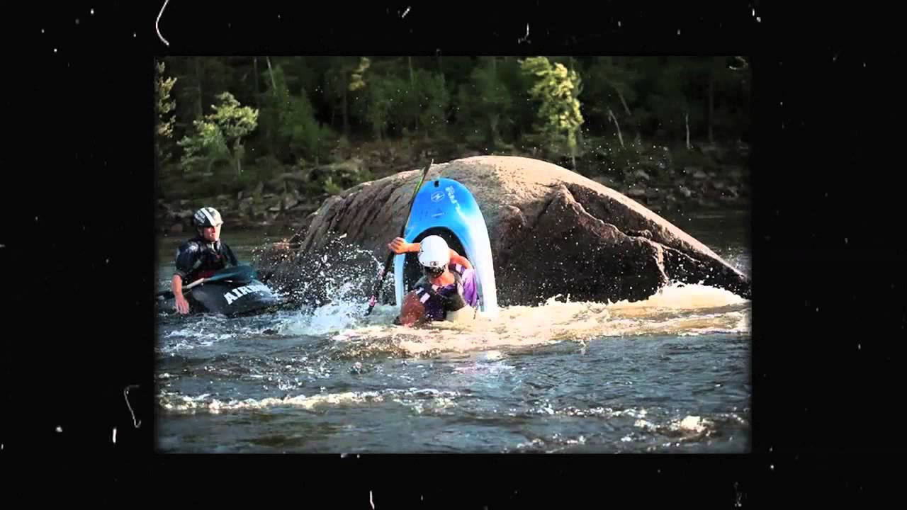 Flatwater loop to splat to high-five. Yeah, it's been a good summer on the Ottawa. Boater: Tyler Curtis. Photographer: Scott Martin. High-five bro: Justin Fraser