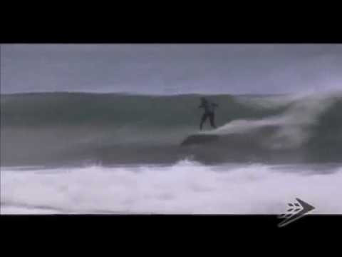Casey Grant surfing on a Firewire surfboard at his local beach of Durban, South Africa