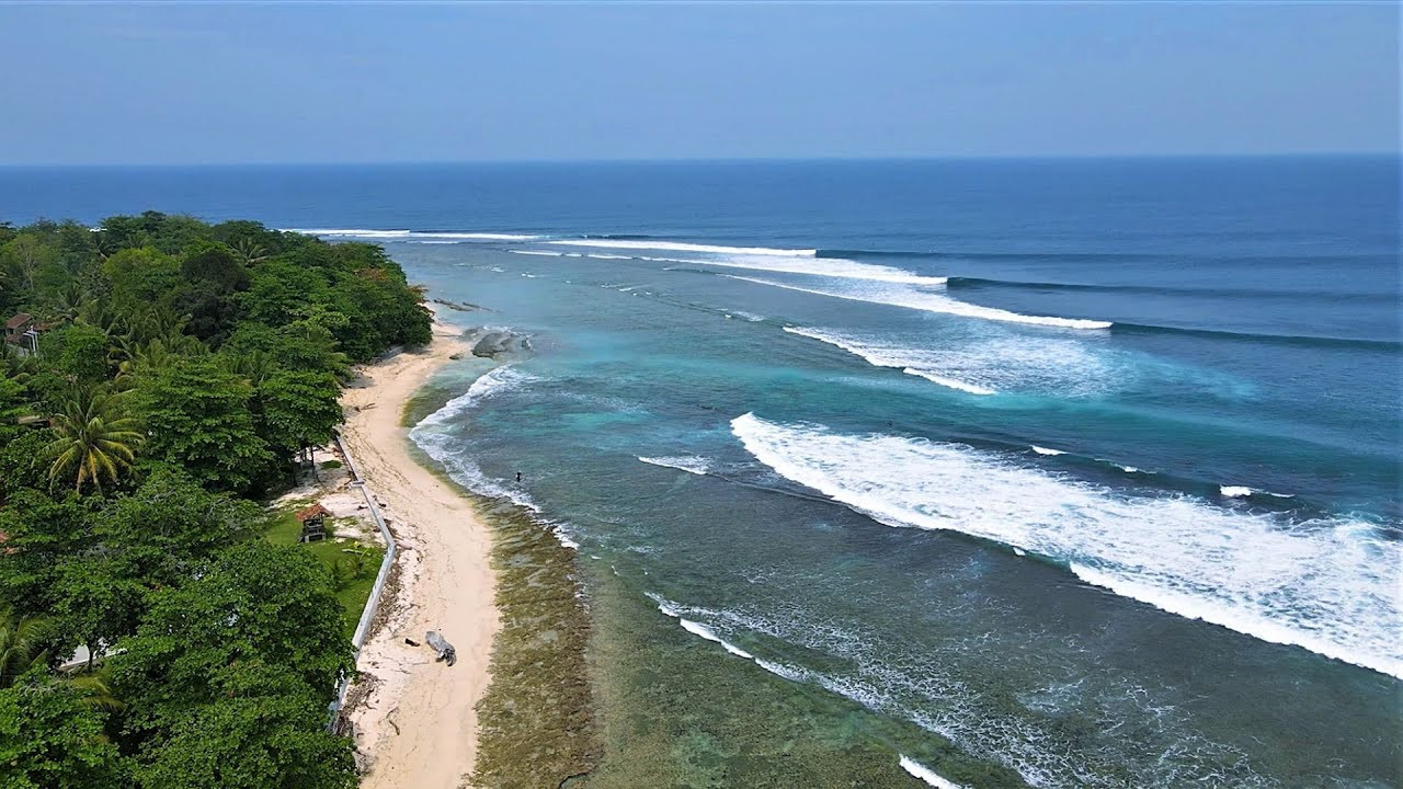 The waves have been really good here in the past week, with perfect lefts rolling down the point all day, every day. It's been smiles all round for the locals and tourists alike, who can't believe they're getting to score such fun surf with only a handful of others!<br /><br />If you would like to support us, please buy us a coffee here: https://www.buymeacoffee.com/infowy<br /><br />If you like the content, please subscribe to the channel here: http://bit.ly/2NPrV5H<br />_____________________________<br /><br />OUR AMAZON STORE: https://www.amazon.com/shop/globalzoo-surfingvideos?ref=ac_inf_tb_vh <br /><br />IF YOU WANT TO CREATE SURF VIDEOS LIKE THIS CHECK OUT THE GEAR WE USE FROM AMAZON: <br /><br />Our camera: https://amzn.to/3XHjiMe <br />Our drone: https://amzn.to/3HauKJg <br />Our main lens: https://amzn.to/3Jo9qCU <br />Our other lens: https://amzn.to/3Ji9XWW <br />Our main tripod: https://amzn.to/3Y6yUZG <br />Our second tripod: https://amzn.to/3Hh9EsJ <br />Our second tripod head: https://amzn.to/3WPpsbQ <br />Our camera bag: https://amzn.to/3HdvTzH <br />The laptop we edit on: https://amzn.to/3Hdwb9L <br />Our external hard drive: https://amzn.to/3Y2lJc0 <br /><br />_____________________________<br /><br />Social media accounts:<br />Instagram: https://www.instagram.com/global.zoo.co/?hl=en<br />Facebook: https://www.facebook.com/Global.Zoo.Co<br /><br />_____________________________<br /><br />DISCLAIMER <br />Some of the links above are affiliate links, where I earn a small commission if you click on the link and purchase an item. You are not obligated to do so, but it does help fund these videos in hopes of bringing value to you! <br /><br />#SurfingBali #SurfingIndonesia #Sumatra #UjungBocur #Sumatra2020 #AlwaysLeft #Surf #Waves #surfersofbali