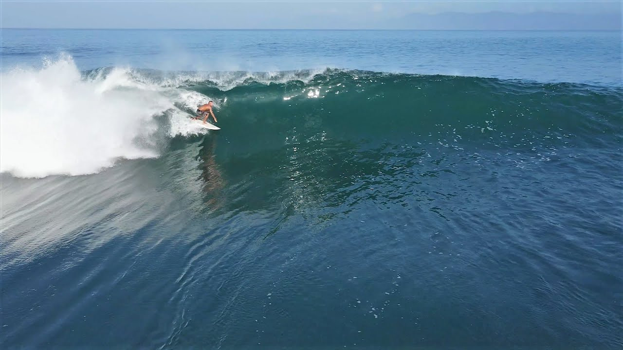 We woke up to some glassy, hollow, and heavy waves a few days ago here in Sumbawa. This break definitely starts to bare its teeth when the swell jacks up, and the tide drops out. There were a few big wipeouts during the morning session a few days ago, a broken board, and some nice barrels too. <br /><br />If you would like to support us, please buy us a coffee here: https://www.buymeacoffee.com/infowy<br /><br />If you like the content, please subscribe to the channel here: http://bit.ly/2NPrV5H<br />_____________________________<br /><br />OUR AMAZON STORE: https://www.amazon.com/shop/globalzoo-surfingvideos?ref=ac_inf_tb_vh <br /><br />IF YOU WANT TO CREATE SURF VIDEOS LIKE THIS CHECK OUT THE GEAR WE USE FROM AMAZON: <br /><br />Our camera: https://amzn.to/3XHjiMe <br />Our drone: https://amzn.to/3HauKJg <br />Our main lens: https://amzn.to/3Jo9qCU <br />Our other lens: https://amzn.to/3Ji9XWW <br />Our main tripod: https://amzn.to/3Y6yUZG <br />Our second tripod: https://amzn.to/3Hh9EsJ <br />Our second tripod head: https://amzn.to/3WPpsbQ <br />Our camera bag: https://amzn.to/3HdvTzH <br />The laptop we edit on: https://amzn.to/3Hdwb9L <br />Our external hard drive: https://amzn.to/3Y2lJc0 <br /><br />_____________________________<br /><br />Social media accounts:<br />Instagram: https://www.instagram.com/global.zoo.co/?hl=en<br />Facebook: https://www.facebook.com/Global.Zoo.Co<br /><br />_____________________________<br /><br />DISCLAIMER <br />Some of the links above are affiliate links, where I earn a small commission if you click on the link and purchase an item. You are not obligated to do so, but it does help fund these videos in hopes of bringing value to you! <br /><br />#SurfingSumbawa #SurfingIndonesia #Sumbawa #LakeyPeak #Sumbawa2021 #SurfingBali #SurfingBali #Bali2021 #AlwaysLeft #Surf #Waves