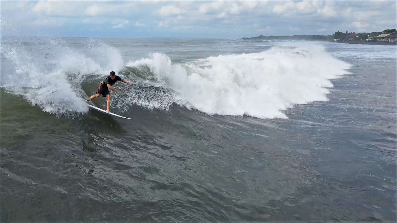 It was far from perfect at Keramas during this session, but even an average day here offers up some walls to carve into and the occasional pit. <br /><br />If you would like to support us, please buy us a coffee here: https://www.buymeacoffee.com/infowy<br /><br />If you like the content, please subscribe to the channel here: http://bit.ly/2NPrV5H<br />_____________________________<br /><br />OUR AMAZON STORE: https://www.amazon.com/shop/globalzoo-surfingvideos?ref=ac_inf_tb_vh <br /><br />IF YOU WANT TO CREATE SURF VIDEOS LIKE THIS CHECK OUT THE GEAR WE USE FROM AMAZON: <br /><br />Our camera: https://amzn.to/3XHjiMe <br />Our drone: https://amzn.to/3HauKJg <br />Our main lens: https://amzn.to/3Jo9qCU <br />Our other lens: https://amzn.to/3Ji9XWW <br />Our main tripod: https://amzn.to/3Y6yUZG <br />Our second tripod: https://amzn.to/3Hh9EsJ <br />Our second tripod head: https://amzn.to/3WPpsbQ <br />Our camera bag: https://amzn.to/3HdvTzH <br />The laptop we edit on: https://amzn.to/3Hdwb9L <br />Our external hard drive: https://amzn.to/3Y2lJc0 <br /><br />_____________________________<br /><br />Social media accounts:<br />Instagram: https://www.instagram.com/global.zoo.co/?hl=en<br />Facebook: https://www.facebook.com/Global.Zoo.Co<br /><br />_____________________________<br /><br />DISCLAIMER <br />Some of the links above are affiliate links, where I earn a small commission if you click on the link and purchase an item. You are not obligated to do so, but it does help fund these videos in hopes of bringing value to you! <br /><br />#SurfingBali #SurfingIndonesia #Bali #Keramas #AlwaysLeft #SurfRawFiles #SurfersOfBali