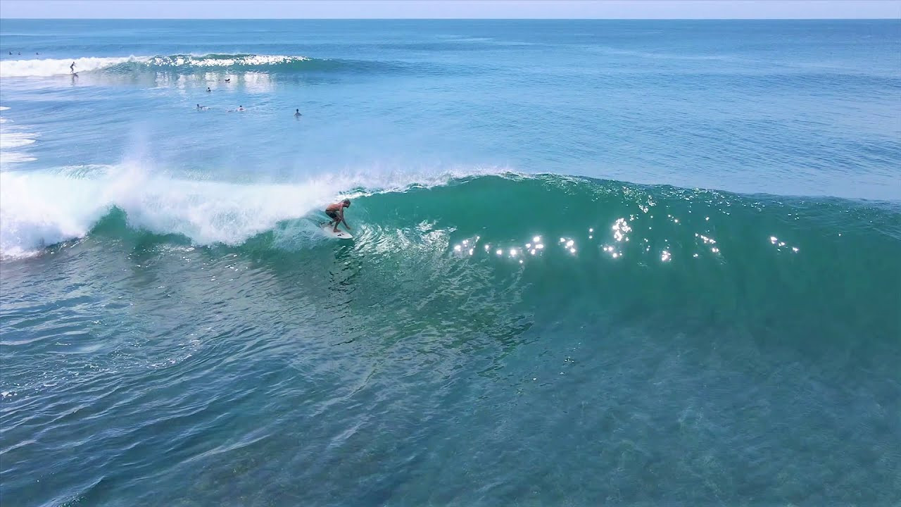 A small to medium swell was running at Uluwatu a couple of days ago, and was hitting the Racetrack section perfectly on the mid/low tide. It was looking pretty dreamy out there with a very light offshore wind, and a shed load of perfect barrels on offer.<br /><br />The surfer at 6:22 managed to get 4 tubes on one wave, but unfortunately the last one closed out on him. Also, how's the grow on the epic barrel at 3:29!<br /><br />If you would like to support us, please buy us a coffee here: https://www.buymeacoffee.com/infowy<br /><br />If you like the content, please subscribe to the channel here: http://bit.ly/2NPrV5H<br />_____________________________<br /><br />OUR AMAZON STORE: https://www.amazon.com/shop/globalzoo-surfingvideos?ref=ac_inf_tb_vh <br /><br />IF YOU WANT TO CREATE SURF VIDEOS LIKE THIS CHECK OUT THE GEAR WE USE FROM AMAZON: <br /><br />Our camera: https://amzn.to/3XHjiMe <br />Our drone: https://amzn.to/3HauKJg <br />Our main lens: https://amzn.to/3Jo9qCU <br />Our other lens: https://amzn.to/3Ji9XWW <br />Our main tripod: https://amzn.to/3Y6yUZG <br />Our second tripod: https://amzn.to/3Hh9EsJ <br />Our second tripod head: https://amzn.to/3WPpsbQ <br />Our camera bag: https://amzn.to/3HdvTzH <br />The laptop we edit on: https://amzn.to/3Hdwb9L <br />Our external hard drive: https://amzn.to/3Y2lJc0 <br /><br />_____________________________<br /><br />Social media accounts:<br />Instagram: https://www.instagram.com/global.zoo.co/?hl=en<br />Facebook: https://www.facebook.com/Global.Zoo.Co<br /><br />_____________________________<br /><br />DISCLAIMER <br />Some of the links above are affiliate links, where I earn a small commission if you click on the link and purchase an item. You are not obligated to do so, but it does help fund these videos in hopes of bringing value to you! <br /><br />#SurfingBali #SurfingIndonesia #Bali #Uluwatu #Bali2020 #AlwaysLeft# Surf #Waves #surfersofbali