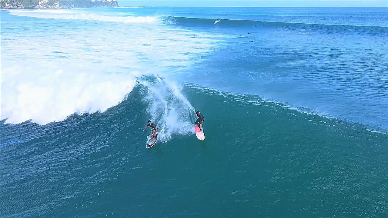 All of Bali's West facing Bukit breaks were going off on Thursday, and we managed to film some action from Impossibles before and after our session at Padang Padang.<br /><br />There were loads of close-outs and wash through sets but some really good waves kept open the whole way down the reef. Check out the 50 second ride at 2:00 and yes, we definitely need a longer lens! <br /><br />If you would like to support us, please buy us a coffee here: https://www.buymeacoffee.com/infowy<br /><br />If you like the content, please subscribe to the channel here: http://bit.ly/2NPrV5H<br />_____________________________<br /><br />OUR AMAZON STORE: https://www.amazon.com/shop/globalzoo-surfingvideos?ref=ac_inf_tb_vh <br /><br />IF YOU WANT TO CREATE SURF VIDEOS LIKE THIS CHECK OUT THE GEAR WE USE FROM AMAZON: <br /><br />Our camera: https://amzn.to/3XHjiMe <br />Our drone: https://amzn.to/3HauKJg <br />Our main lens: https://amzn.to/3Jo9qCU <br />Our other lens: https://amzn.to/3Ji9XWW <br />Our main tripod: https://amzn.to/3Y6yUZG <br />Our second tripod: https://amzn.to/3Hh9EsJ <br />Our second tripod head: https://amzn.to/3WPpsbQ <br />Our camera bag: https://amzn.to/3HdvTzH <br />The laptop we edit on: https://amzn.to/3Hdwb9L <br />Our external hard drive: https://amzn.to/3Y2lJc0 <br /><br />_____________________________<br /><br />Social media accounts:<br />Instagram: https://www.instagram.com/global.zoo.co/?hl=en<br />Facebook: https://www.facebook.com/Global.Zoo.Co<br /><br />_____________________________<br /><br />DISCLAIMER <br />Some of the links above are affiliate links, where I earn a small commission if you click on the link and purchase an item. You are not obligated to do so, but it does help fund these videos in hopes of bringing value to you! <br /><br />#SurfingBali #SurfingIndonesia #Bali #Impossibles #Bali2020 #AlwaysLeft #Surf #Waves #surfersofbali