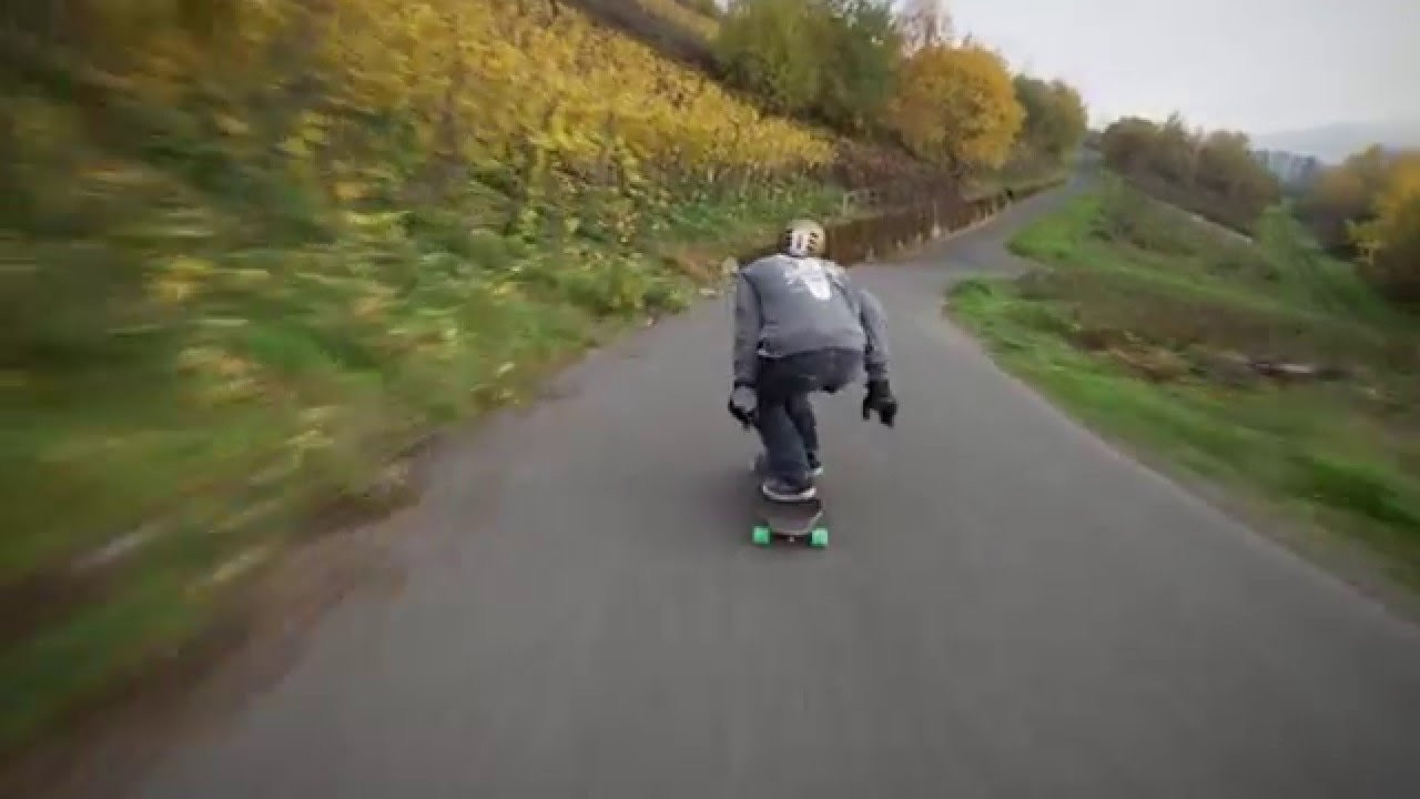 Check out our staff-member Jan Kreisel Saraiva skating down a narrow road somewhere in the mosel-valley. This road is part of the wrc-track for the "ADAC Deutschland Rally". Jan is riding a Quinboards Prototype with G.O.G. Freeride Trucks with Sunrise Gummies Bushings, Walzen Insul Wheels and Sunrise Bearings.<br /><br />Quinboards: http://www.concretewave.de/quinboards_Angebote<br />Walzen Insul Wheels: http://www.concretewave.de/Walzen+Insul+Wheels_5297<br />Sunrise Bearings: http://www.concretewave.de/Sunrise+Kugellager+Abec5+%2B+High+Precision+Spacer_4737<br />Sunrise Gummies Bushings: http://www.concretewave.de/Sunrise+Gummies+Bushings+Double+Barrel_4173<br /><br />Music: Smokin' Valves by Holocaust