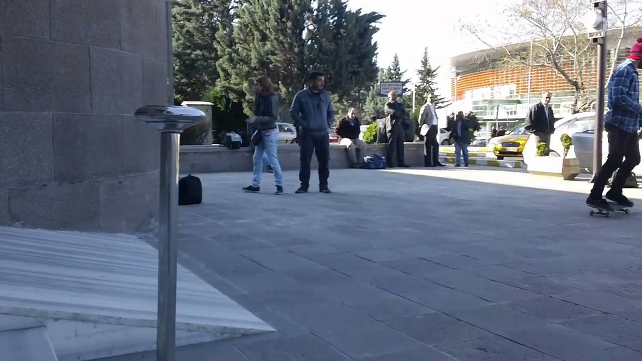 Here is a clip of Dane Burman doing a 360 and Tommy Sandoval doing a shuv-it-late flip on a small bank.