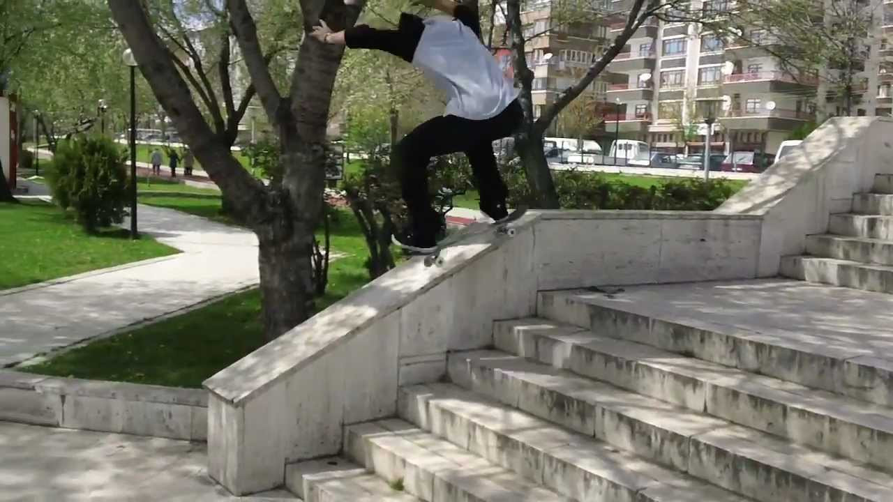 Jack Curtin doing a quick tail to 50-50 grind.