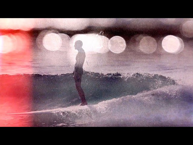 Matthew Allen's first foray into surf film. Bathed in light leaks and film grain, Mega Glide takes the psychedelic lighting that Allen captures in his Borrowed Light photo series and brings it to life, the light moving with and around surfer Shawn Parkin as he navigates the waves. The boys posted up at a local point break and former Surfer's Journal photo editor Parkin proceeded to smoothly glide his Deepest Reaches Megafish from the top of the point all the way to the sand, over and over again. <br /><br />Film by Matthew Allen<br />Surfing By Shawn Parkin<br />Surfboard by Deepest Reaches<br />Wetsuit by Thalia Surf<br />Music by Matthew Allen