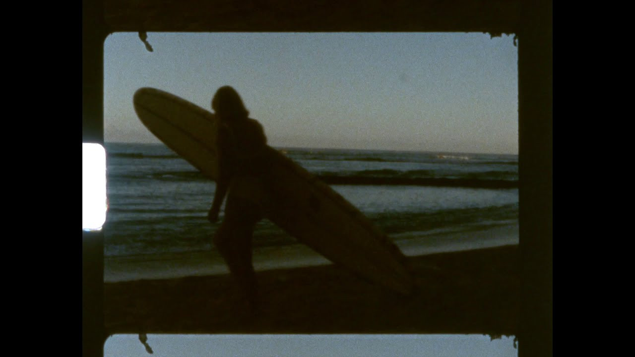 On a routine morning in Hawaii where orange sunrise leads to blue skies, a playground for surfers lie beneath the peak of Mt. Leahi (Diamond Head). The hue of blue color above is complimented below while surfers glide and boats make there voyage out to sea and back. Shot by Drew Heald, a morning session with Hannah and friend Caroline, the duo frolic on a mid-winter swell in the warm water of Waikiki.