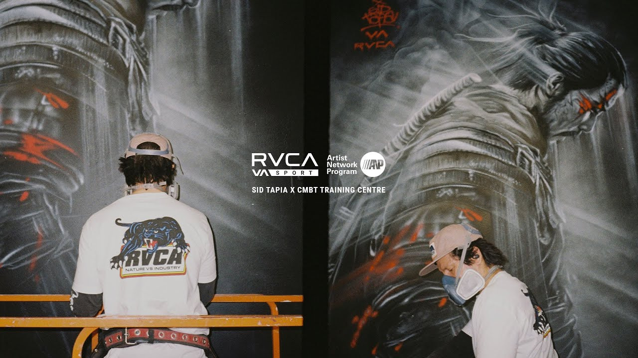 Description: ANP artist Sid Tapia took over CMBT Training Centre with a mural built on discipline, honour, and resilience - everything the crew lives and breathes. Art that hits as hard as the training. More than a mural, it stands as a core principle for the gym.<br /><br />Shop RVCA : https://www.rvca.com/