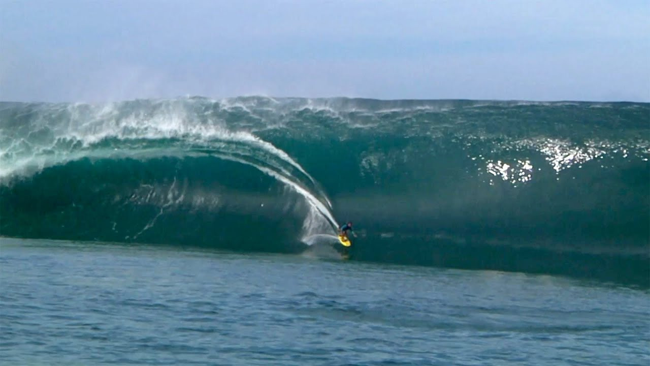 Watch Raimana Van Bastolaer riding a giant wave at Teahupoo, Tahiti.<br /><br />The ride was shot during a 2011 Red Bull Junior Surf Training Camp held by Red Bull at the infamous Polynesian surf break.<br /><br />The year 2011 marked a "Code Red" event at Teahupoo, with some of the heaviest and biggest waves detonating at the local reef.<br /><br />Van Bastolaer is a professional big wave surfer and training coach.<br /><br />Footage: Red Bull