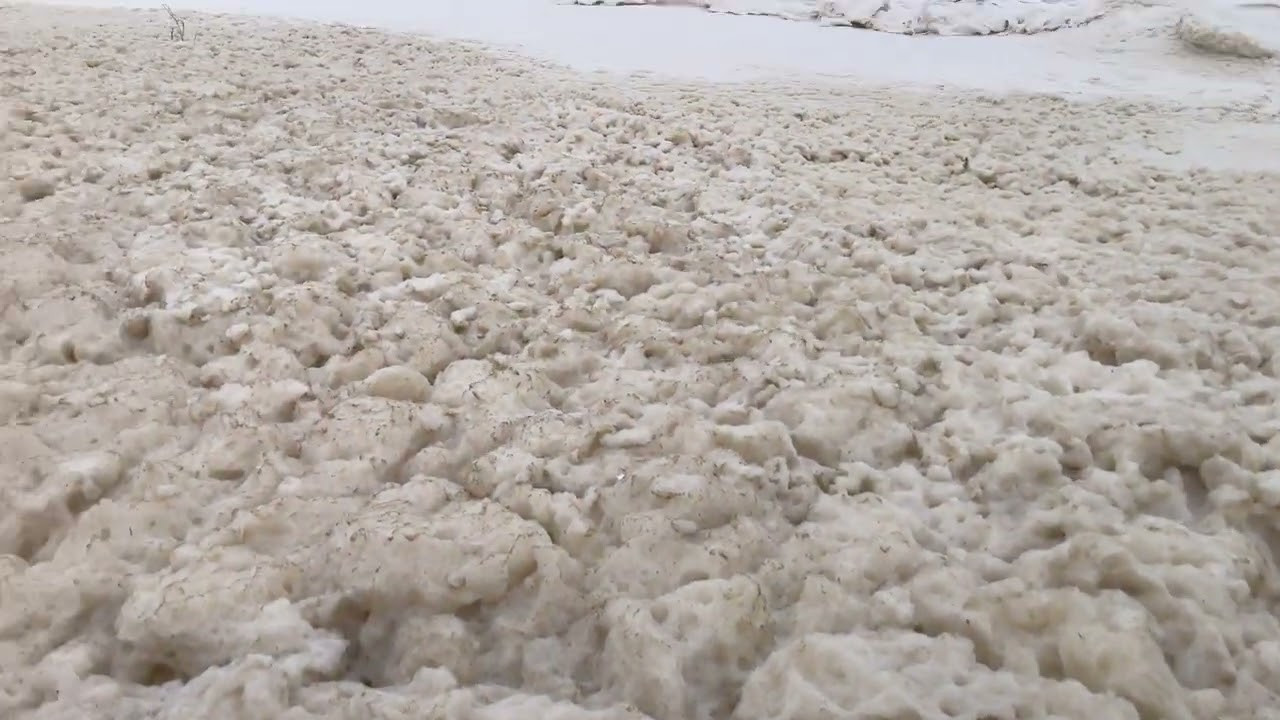 A massive bed of sea foam covered a large part of Leça da Palmeira Beach, near Porto, Portugal.<br /><br />The natural phenomenon was generated by several back-to-back storms that slammed the southwestern European nation after Depression Kristin made landfall, causing widespread destruction and several deaths.<br /><br />Sea foam is common in the north of Portugal during North Atlantic-generated winter swells, but the region never witnessed anything like this.<br /><br />The blanket of spume covered the sand strip from the low tide line to the seaside promenade, with parts being blown into the nearby streets.<br /><br />From late January 2026 to early February, Portugal registered the highest wind speed ever on record: 129,7 miles per hour (208,8 kilometers per hour).<br /><br />Over 850,000 people lost power when Storm Kristin hit the territory.<br /><br />Several cities became war zones, cut off from the outside world without communications, electricity, water, and gas supply. High-voltage transmission towers were obliterated.<br /><br />The state of calamity was declared.