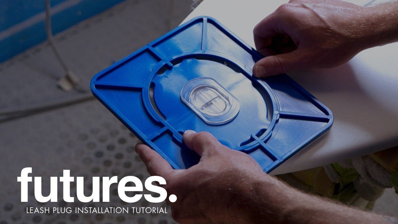 Ready to install your Futures Leash Plug? In this quick, step-by-step tutorial, we break down everything you need to know to get a precise, hassle-free installation on your surfboard.<br />From unboxing the Futures Leash Plug Kit to modifying your Makita RT0701C router with our custom clear faceplate and depth washers, we show you the exact measurements and techniques the pros use.<br /><br />Video Timeline<br />00:00 - Unboxing the Kit<br />Intro to the Futures Leash Plug Kit components: router plate, one-pass bit, and target.<br /><br />00:13 - Router Teardown<br />Taking apart the stock Makita RT0701C router to prep it for the custom faceplate.<br /><br />00:47 - Installing the Futures Faceplate<br />How to properly align and lock the custom clear faceplate using the built-in bridge bar.<br /><br />01:17 - Removing Extra Hardware<br />Removing the extra locking nuts with a 5/16" wrench to complete the base modification.<br /><br />01:50 - Prepping the Router Bit<br />Adding the two depth washers to the One-Pass leash plug bit to guarantee the perfect depth.<br /><br />02:19 - Marking & Routing<br />Aligning the target (recommended 1.5 inches from the tail) and routing out the plug cavity.<br /><br />02:52 - Final Fit Check<br />Dropping the leash plug into place to ensure a flawless, flush fitment.