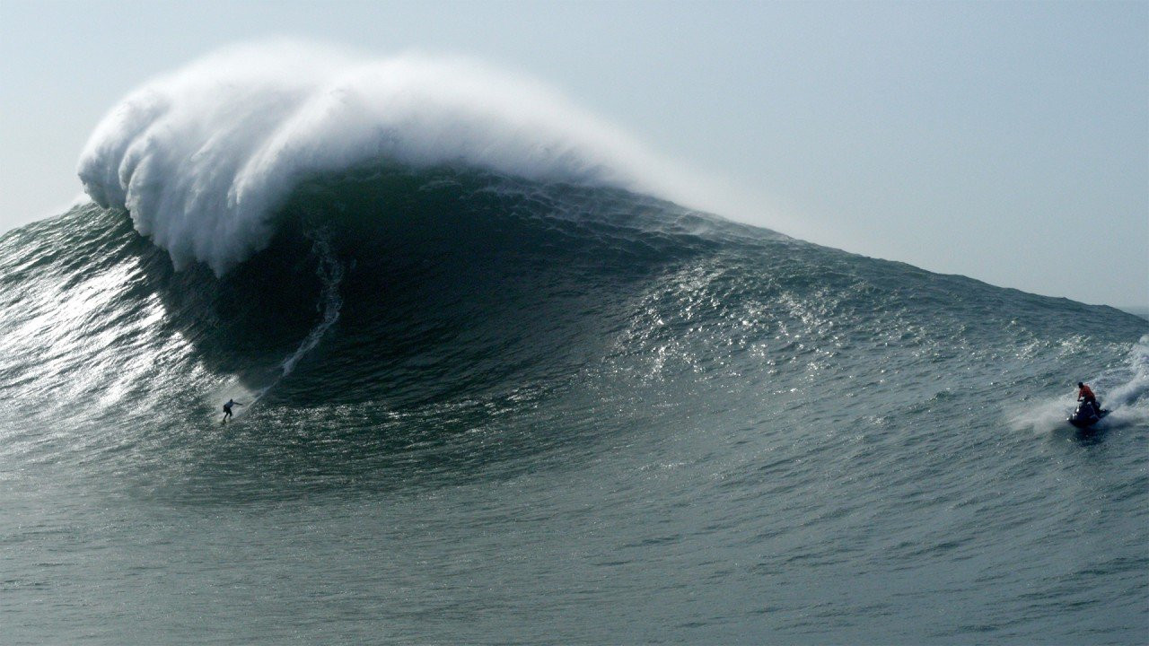 Imagine experiencing the raw power of Nazaré from the water on a jet ski, getting as close to the waves as a non-professional safely can, spending personal face time with Nic von Rupp, and seeing the behind-the-scenes world of big-wave surfing that very few people ever get to witness.<br /><br />Professional big-wave surfer Nic von Rupp has partnered with LUEX Travel to launch ON! Days, a new alert-based experience that gives surfers and ocean enthusiasts access to Nazaré during its most promising big-wave windows.<br /><br />Rather than booking fixed travel dates, participants register for a swell alert and are invited when the forecast lines up.<br /><br />The experience goes far beyond simply watching massive waves from the lighthouse.<br /><br />Guests head out onto the ocean by jet ski to experience Nazaré's raw power from the water, getting as close to the waves and the elements as safely possible in a way that only professional big-wave surfers normally do.<br /><br />They also spend personal time with Nic throughout the experience, sharing meals and conversations while gaining behind-the-scenes insight into how he and his team prepare for these rare swells, from forecasting and safety operations to the local knowledge and split-second decision making that takes place when Nazaré comes to life.<br />Full story:<br />https://www.surfertoday.com/surfing/on-days-nazare-big-wave-experience