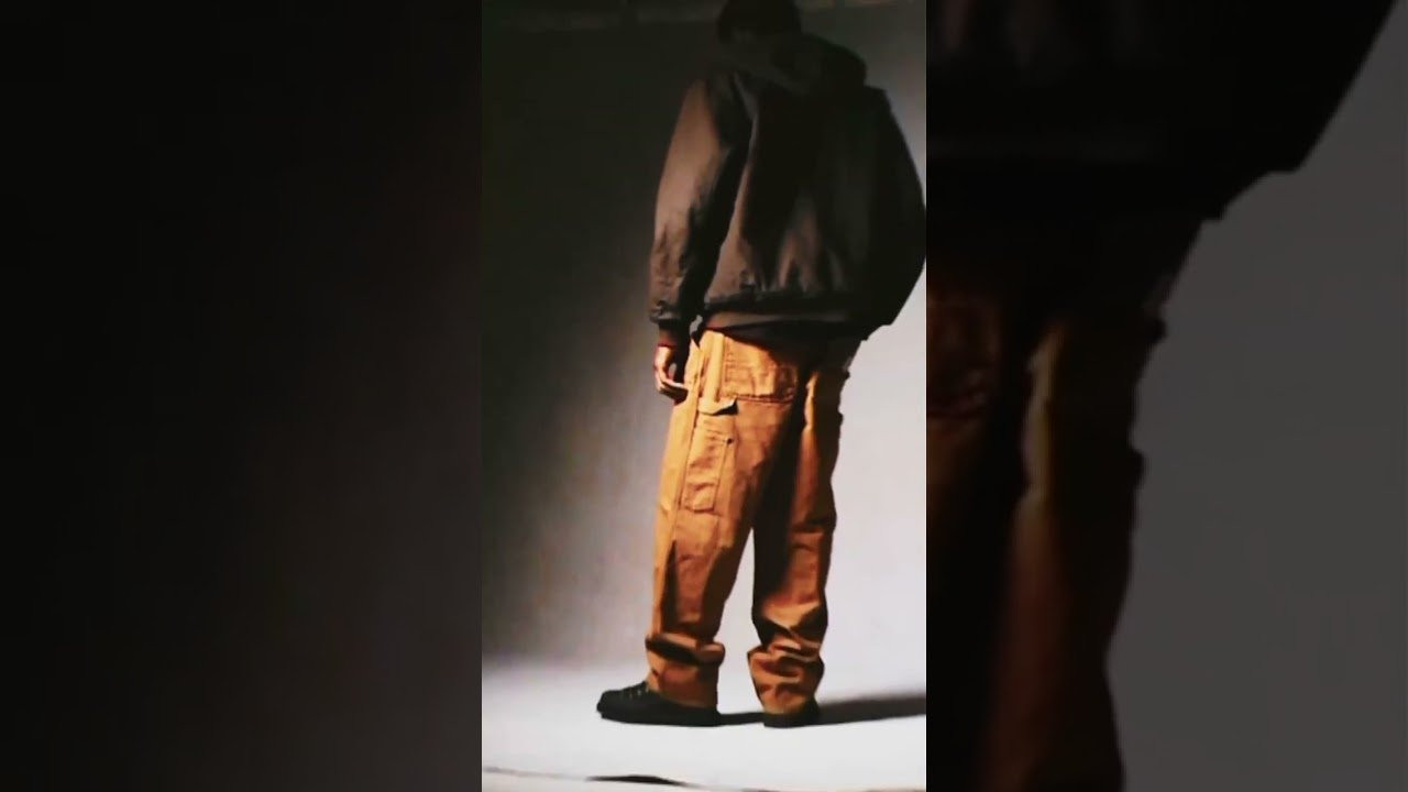 A deeper look at our Icons. A silhouette more than 80 years in the making. Same DNA, same details, updated through a Carhartt WIP lens with new fabrics, finishes, and colorways.<br /><br />The Double Knee Pant is directly adapted from an archival work pant. You’ll see it in the construction details: reinforced knee paneling with metal rivets, multiple tool pockets, and a hammer loop. This was the blueprint for our Single Knee and Simple Pants.